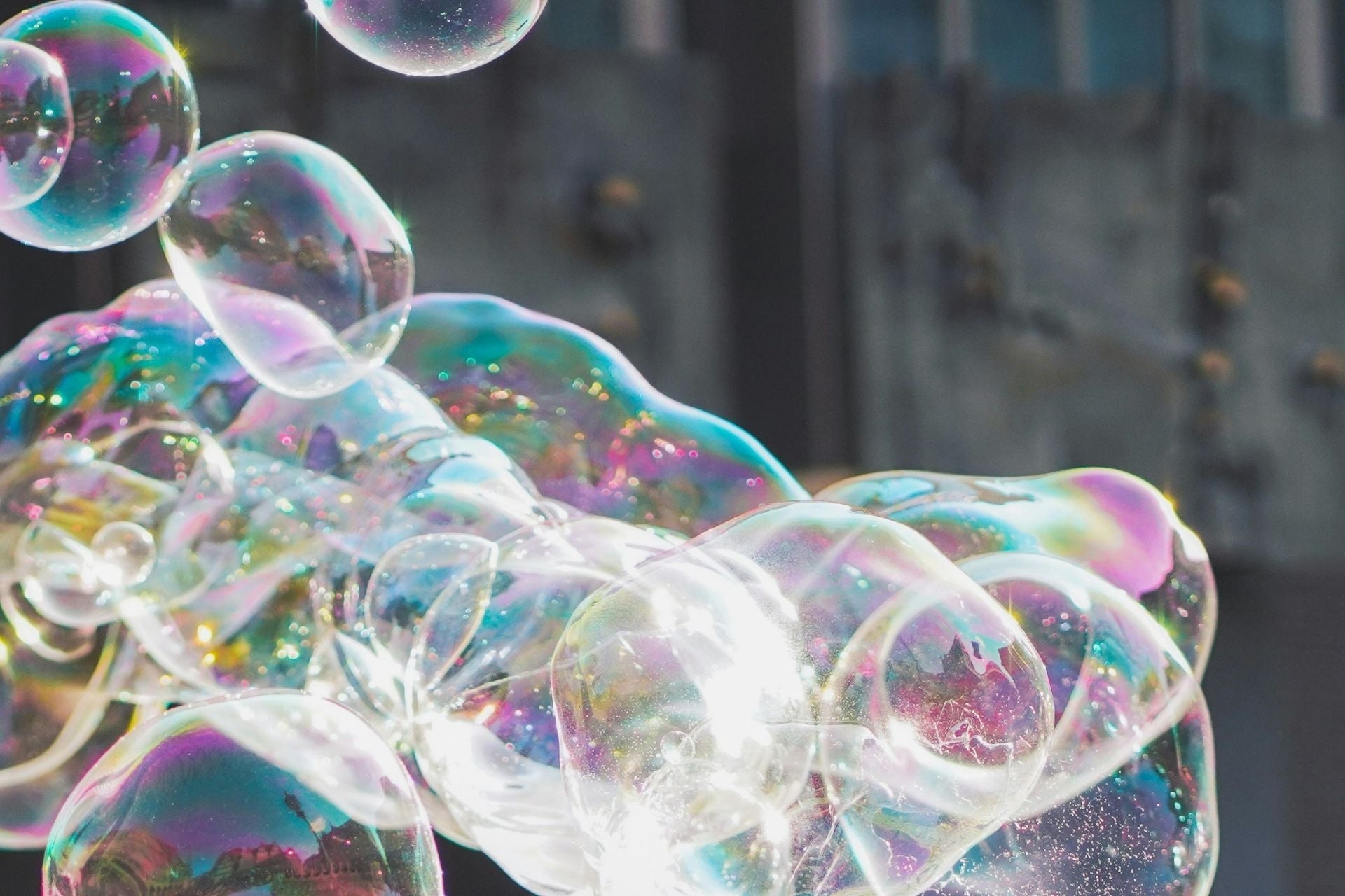 Iridescent soap bubbles floating in the light, the banner for NSJ's kids range